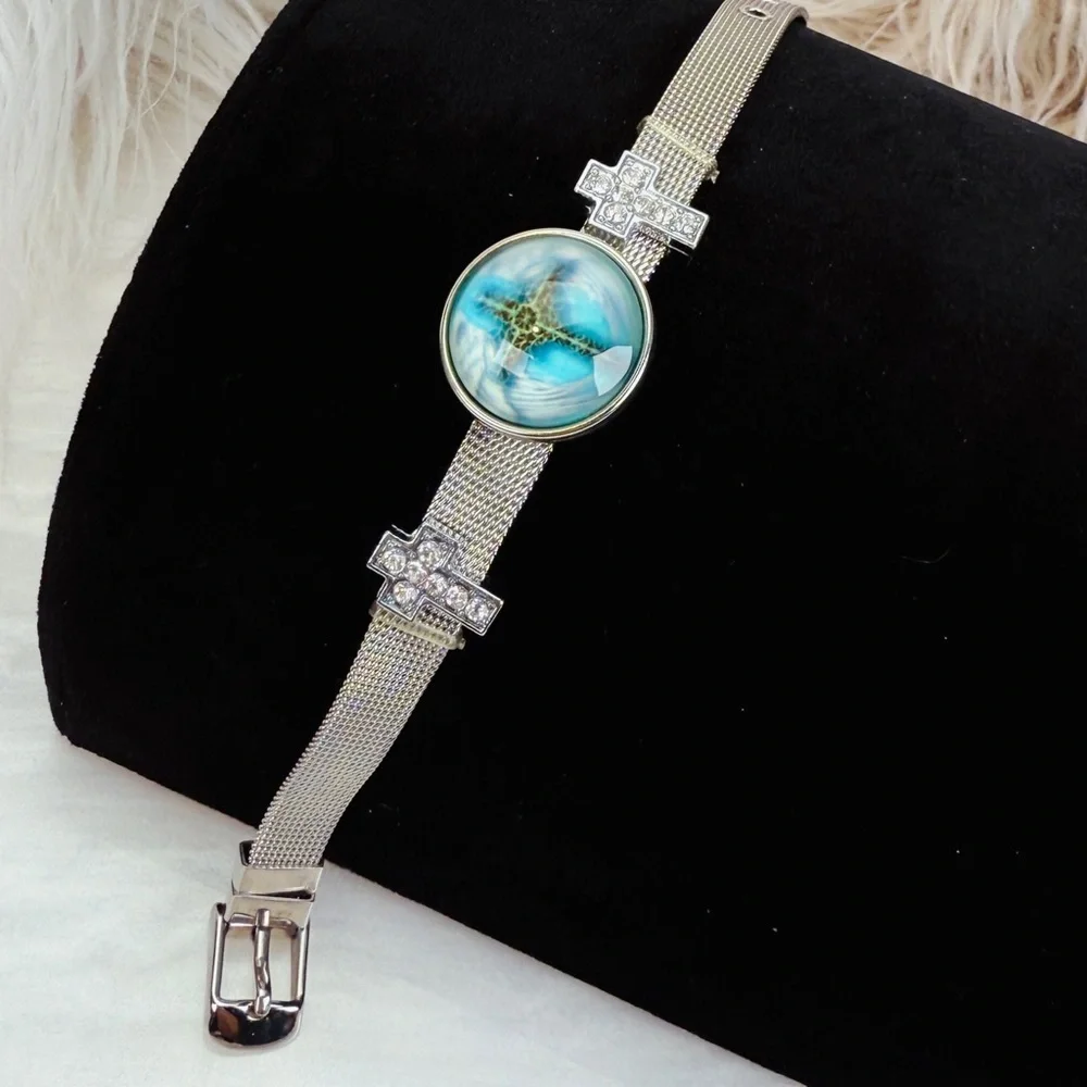 Silvertone Mesh Snap Bracelet with Blue Cross Design